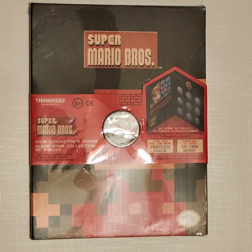 THINKGEEK Super Mario Bros. Coin Collector's Album BNIP Holds 10 Coins NINTENDO
